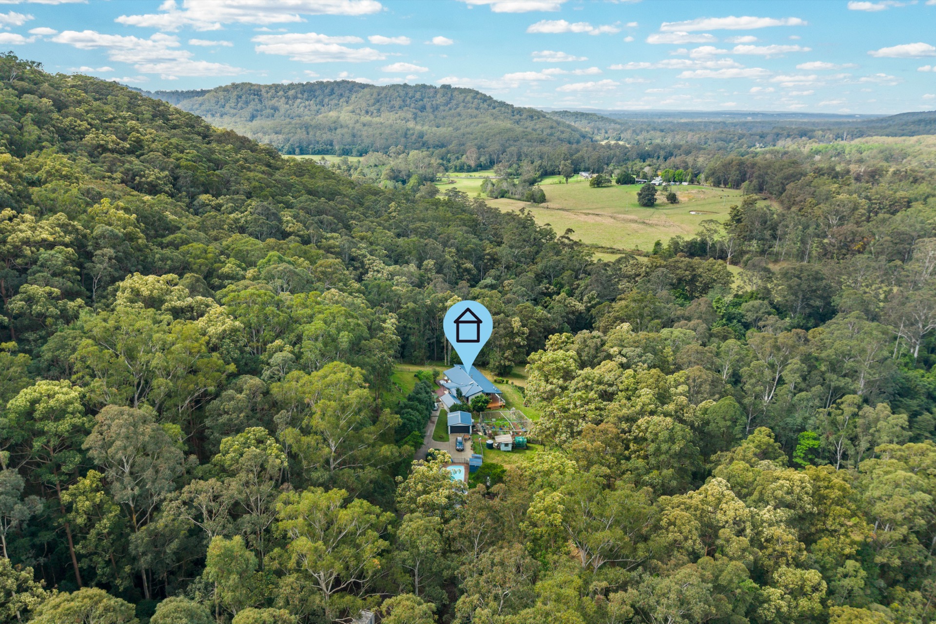 Aerial view of the Watagan hinterland forest and valley around Martinsville
