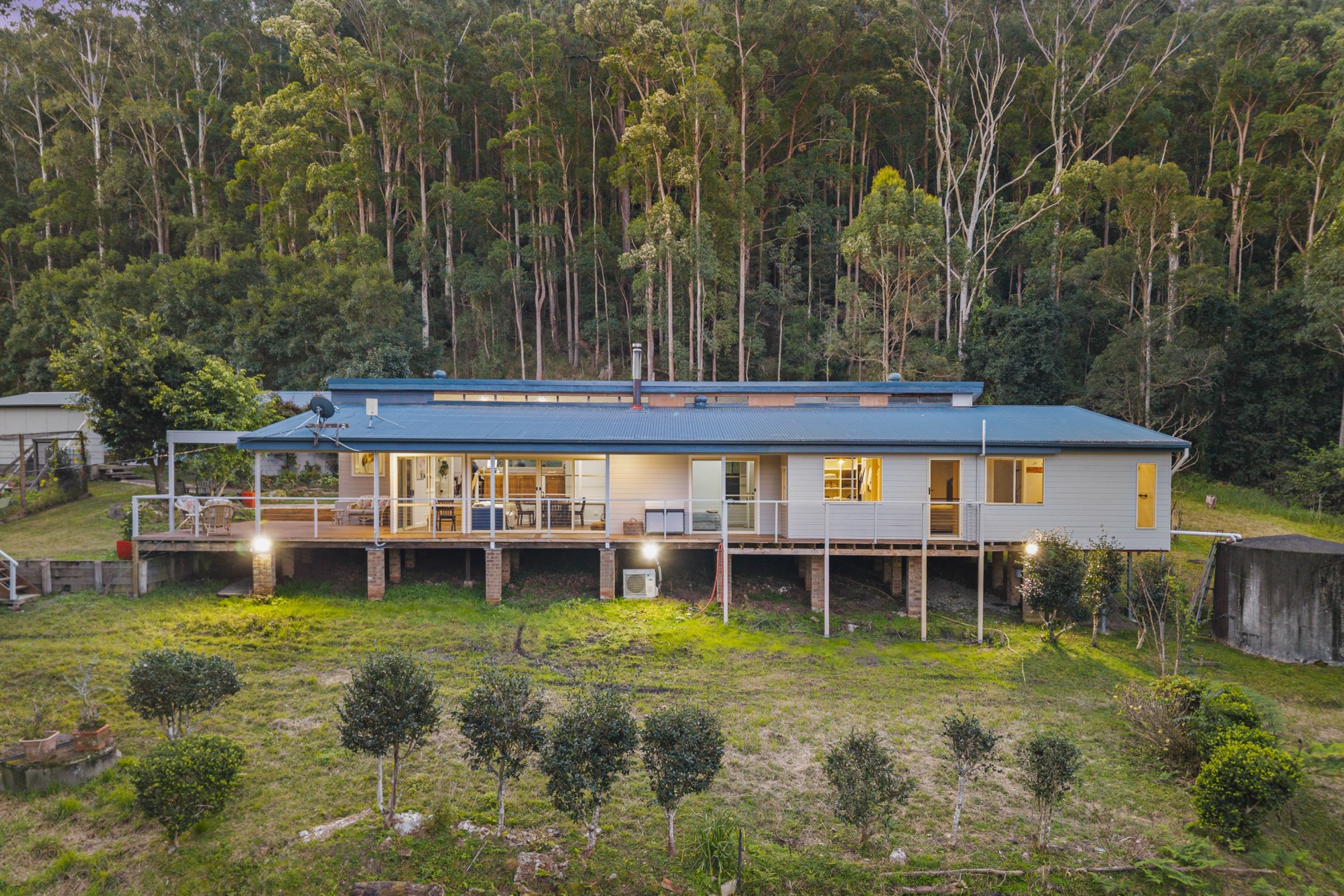 32 Geerings Road Martinsville - freshly renovated home with large decking on 3 sides, surrounded by forest